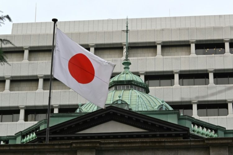 The Bank of Japan made a widely expected move away from years of ultra-loose monetary policy . ©AFP