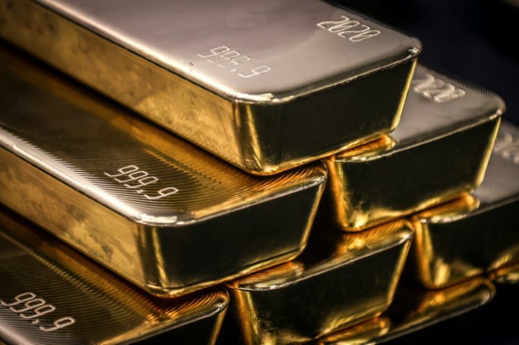 Gold hit $2,141.79 per ounce to break a record it had reached in December. ©AFP