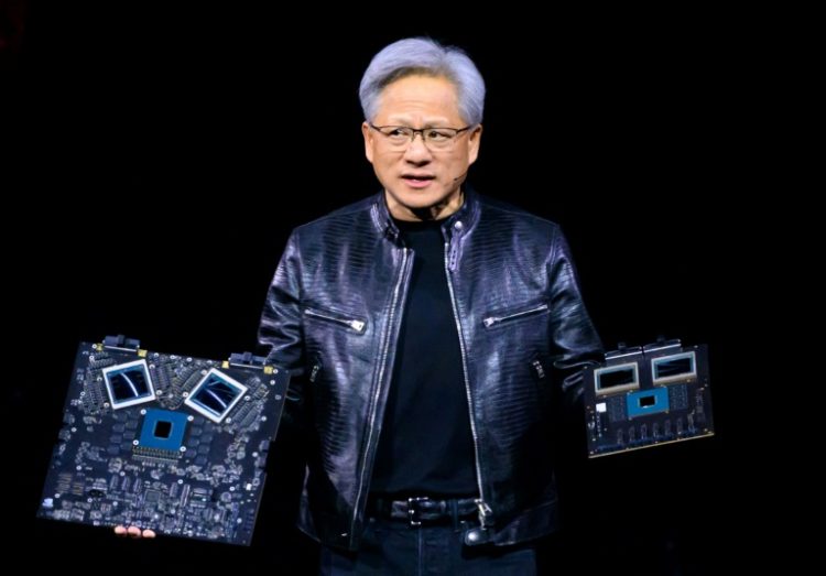NVIDIA CEO Jensen Huang says chips powering artificial intelligence in datacenters have become systems containing tens of thousands if not hundrends of thousands of parts, many made in China. ©AFP