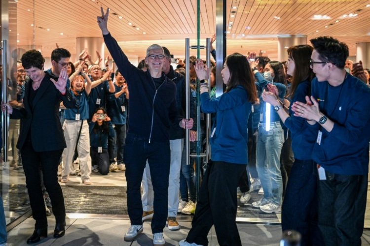 Apple CEO Tim Cook attended the opening of his company's newest store in Shanghai, amid growing worries over the iPhone maker's market share in China. ©AFP