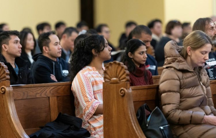 A church in Zagreb holds mass in English for the country's rising migrant community. ©AFP