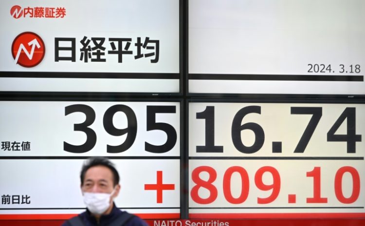Traders in Asia were cautious on Monday as anticipation builds for the Bank of Japan to finally ditch its negative interest rate. ©AFP