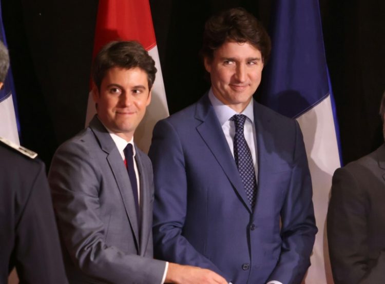 Canadian Prime Minister Justin Trudeau (R) and French Prime Minister Gabriel Attal backed the trade pact between Canada and the European Union. ©AFP