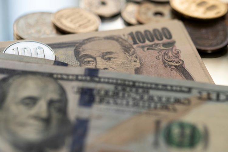 The yen has fallen almost nine percent against the dollar this year, according to Bloomberg . ©AFP