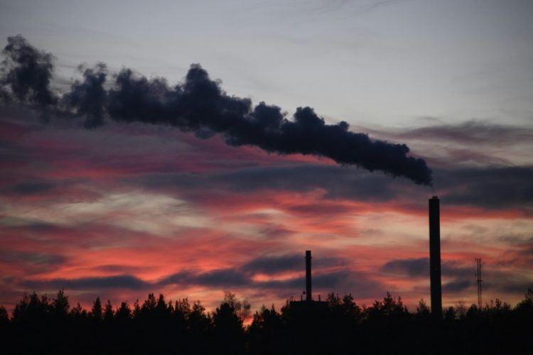 Smoke comes out a factory in Vasaa, Finland on December 6, 2022. ©AFP