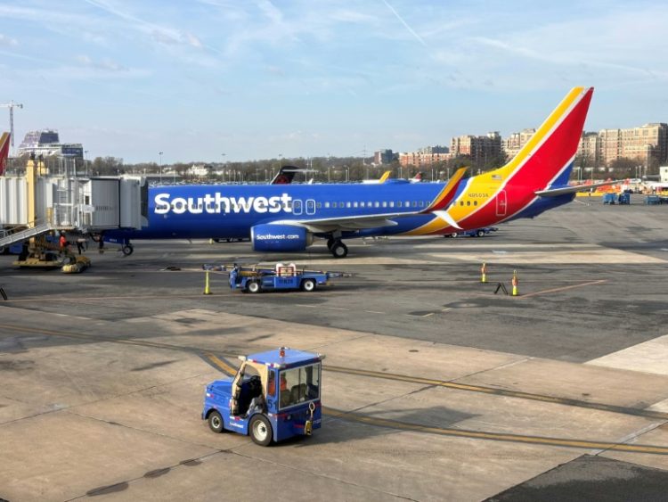 A Southwest Airlines Boeing 737 sits at a gate at Washington's Reagan National Airport (DCA) in Arlington, Virginia, on March 31, 2024. ©AFP