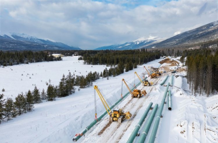 This December 9, 2021, image courtesy of Trans Mountain Corporation shows winter pipeline construction work in Valemount, British Columbia, Canada. The first major new pipeline to be built in Canada in decades is set to open on May 1. ©AFP