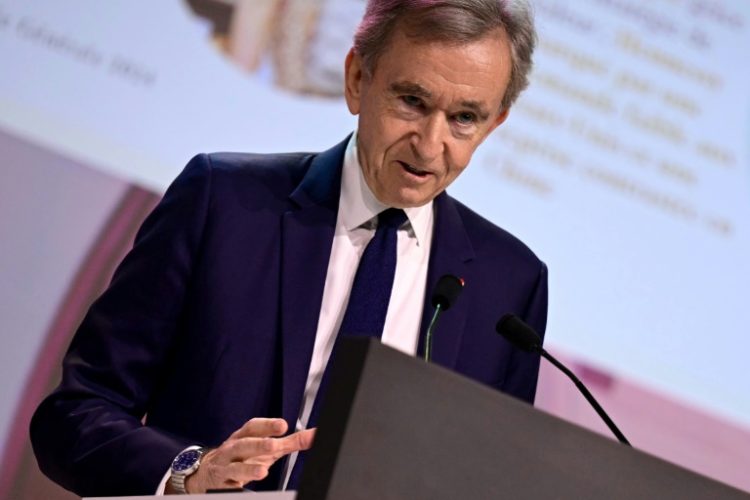 Arnault appeared in ebullient mood at the meeting. ©AFP