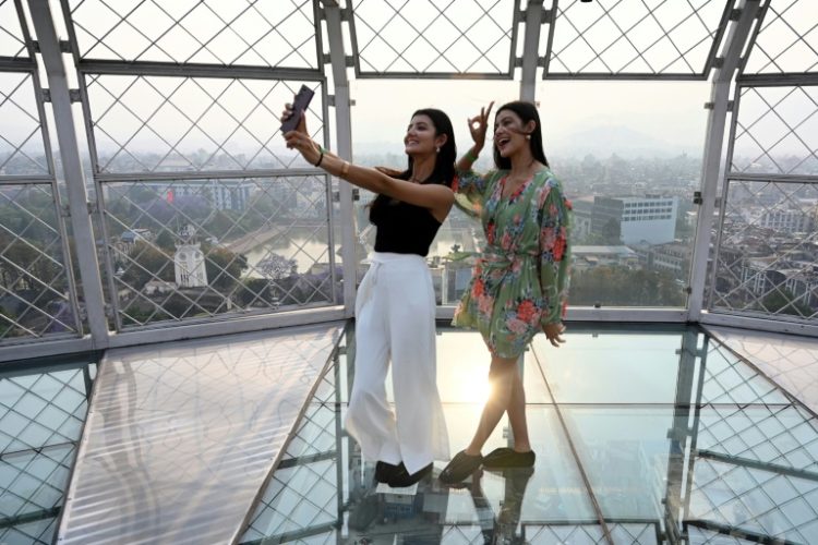 After joining TikTok in 2018, twin sisters Prisma and Princy Khatiwada built a following of nearly eight million on TikTok with videos of their synchronised dance routines. ©AFP