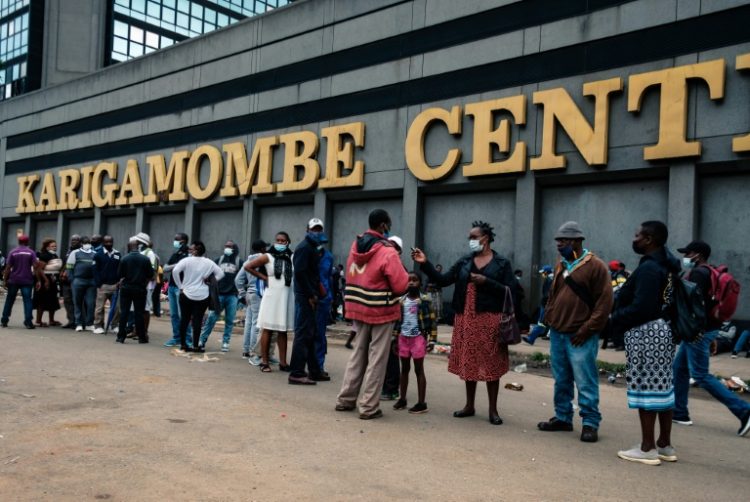Most Zimbabweans prefer to do business, get paid and hold their savings in US dollars. ©AFP