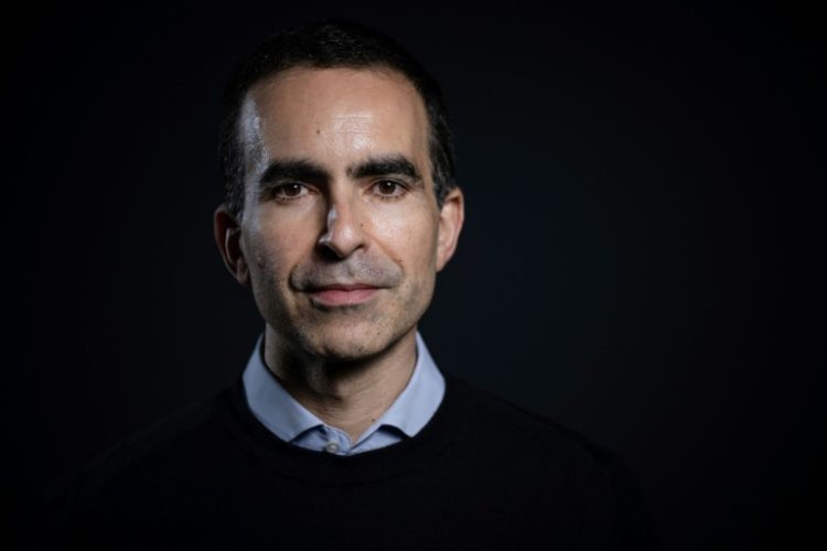 Karim Beguir, the founder and CEO of InstaDeep, says artificial intelligence presents an opportunity for African economies to go beyond simply exporting raw materials. ©AFP