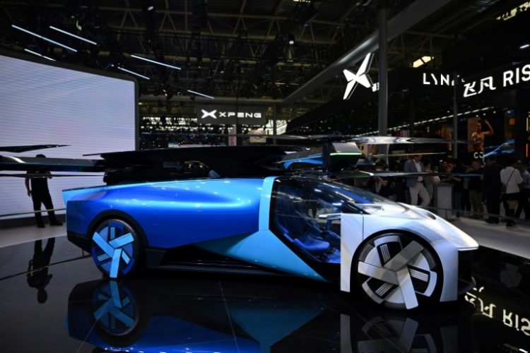 A Xpeng AeroHT flying concept car is displayed at the Beijing Auto Show . ©AFP