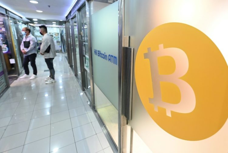 Hong Kong's securities regulator granted conditional approval for city's first spot-bitcoin and ether exchange traded funds. ©AFP