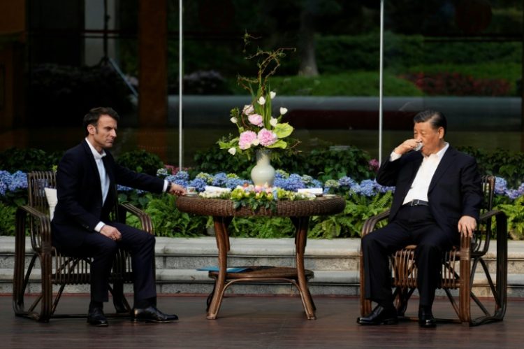 Chinese President Xi Jinping (R) and French President Emmanuel Macron met in China in April 2023. ©AFP