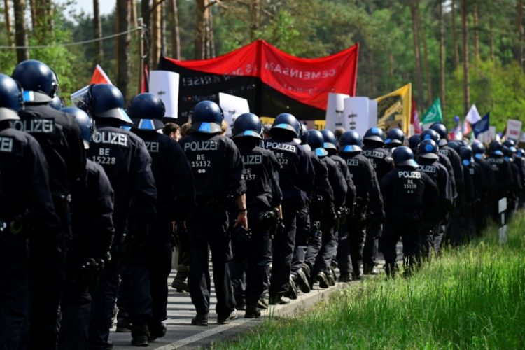 Police were out in force on Saturday as some protesters tried to get into the factory the day before. ©AFP