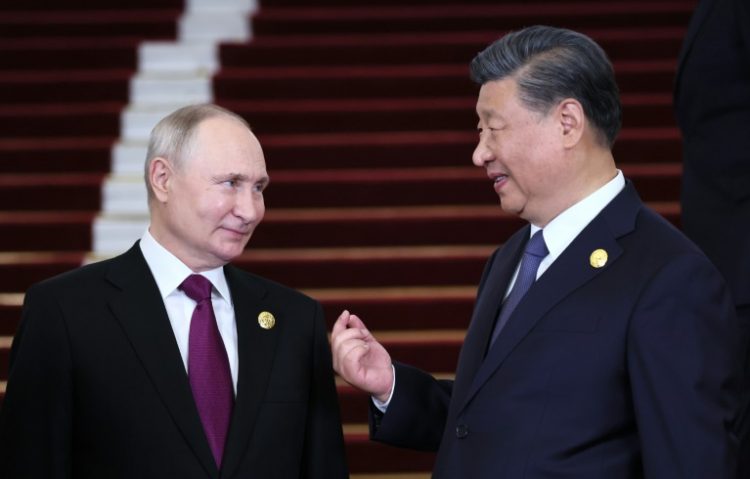 Beijing said President Xi will exchange views with Putin on bilateral ties. ©AFP