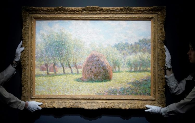 Claude Monet's 'Meules a Giverny,' which the French impressionist painted in 1893, went for $34.8 million after a bidding war. ©AFP