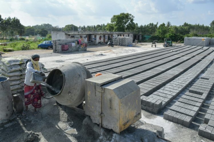 Some 14 billion cubic metres of concrete are cast every year around the globe, according to industry figures.. ©AFP