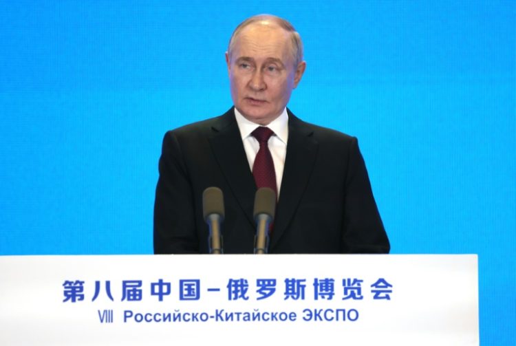 Putin arrived Thursday on his first trip abroad since his March re-election, meeting President Xi Jinping for talks in which the leaders framed their nations' ties as a stabilising force in a chaotic world. ©AFP