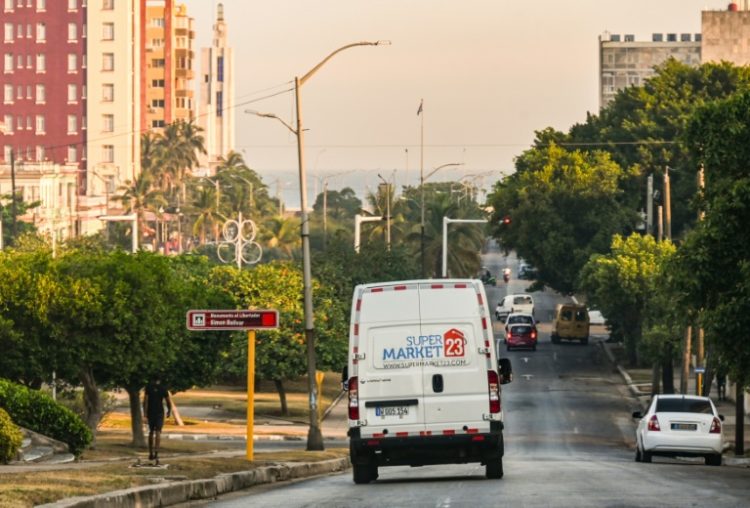 A delivery van from a US-based food remittance company drives on a street in Havana on May 22, 2024. ©AFP