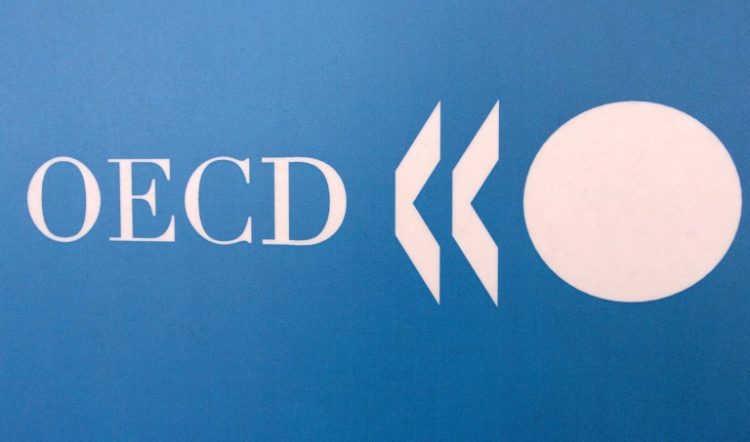 The world economy is expected to expand by 3.1 percent this year, up from a previous projection in February of 2.9 percent, according to the the Organisation for Economic Cooperation and Development. ©AFP