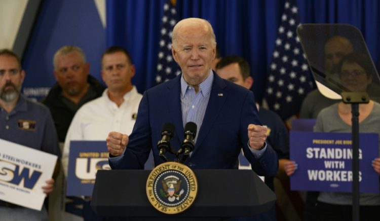 President Joe Biden in April unveiled steel tariffs at the United Steel Workers Headquarters in Pittsburgh after receiving the union's endorsement the  prior month. ©AFP