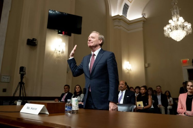 Microsoft President Brad Smith spent more than three hours answering questions from members of the Homeland Security Committee in Washington. ©AFP