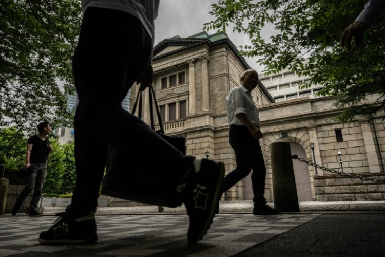 Each month the Bank of Japan targets monthly government bond purchases of around $38 billion. ©AFP