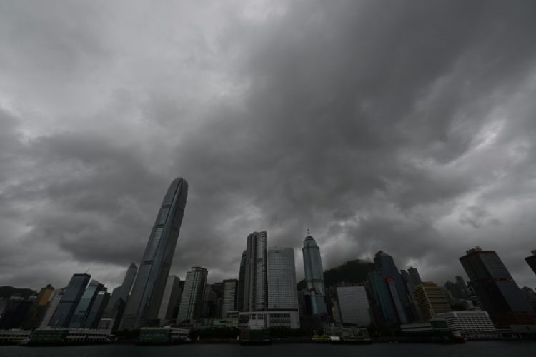 Hong Kong's stock exchange will implement new rules in September to continue trading through inclement weather. ©AFP