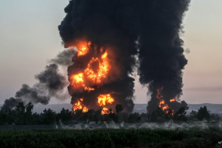 The cause of the blaze, which began in an asphalt tank, was not yet known, Iraqi civil defence said. ©AFP