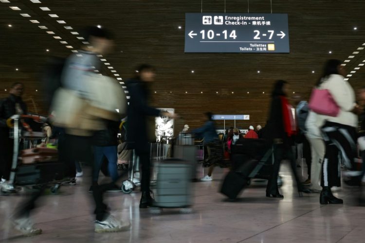 Passengers at Paris Charles de Gaulle. ©AFP