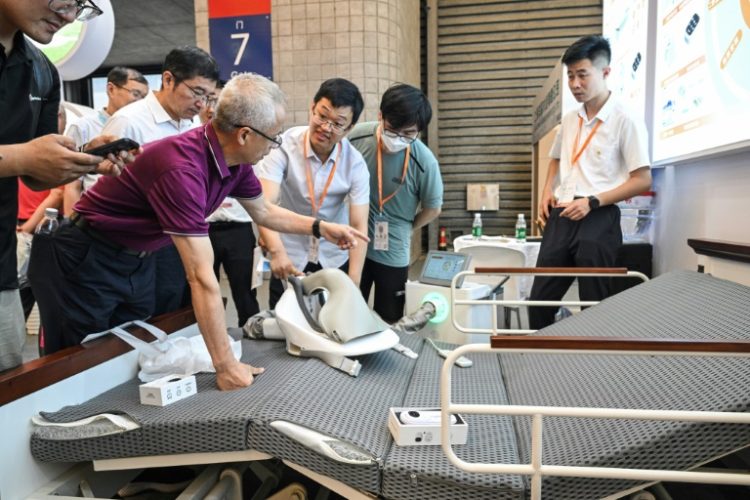 China's elder care industry is hoping automation will provide the solution to an ageing population and a shrinking workforce. ©AFP