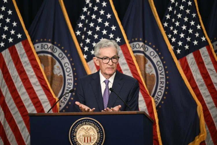 Jerome Powell said the Fed was prepared to keep interest rates where they are 'as long as appropriate' if inflation persists and growth remains strong. ©AFP