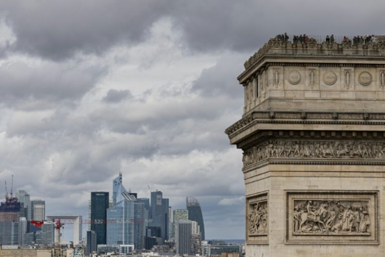 La Defense, the French capital's business district, seen behind the Arc de Triomphe in Paris. ©AFP