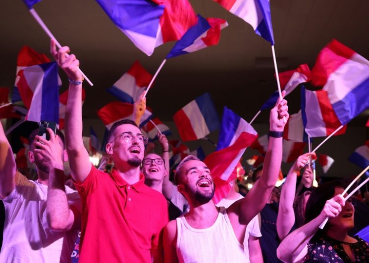 The far-right Rassemblement National (RN) was on course to win the most seats in France's legislative elections but it was uncertain whether it would win an absolute majority. ©AFP