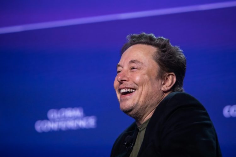 Tesla has urged shareholders to vote in favor of CEO Elon Musk's huge pay plan after a Delaware judge struck it down . ©AFP