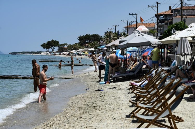 Deckchairs and sunbeds taking off almost all of a beach on the Halkidiki peninsula in northern Greece. ©AFP