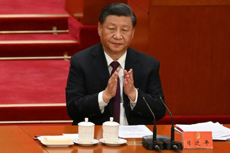 China's President Xi Jinping attends the closing ceremony of the 20th Chinese Communist Party's Congress in October 2022. ©AFP