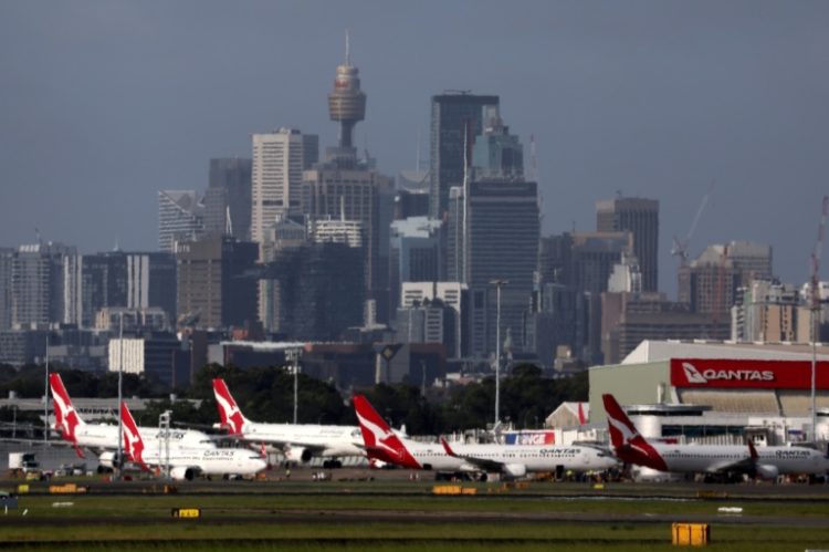 A large-scale outage wrought havoc on IT systems, causing travel delays at Sydney Airport. ©AFP