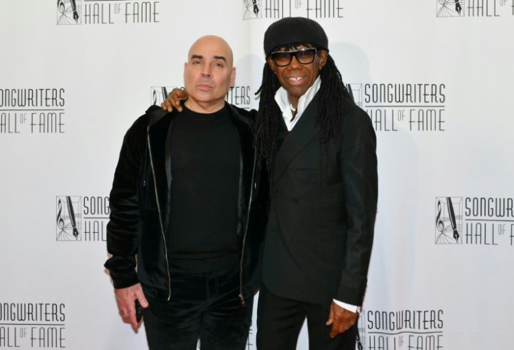 Hipgnosis executive Merck Mercuriadis (L) and co-founder Nile Rodgers attend the Songwriters Hall of Fame 2024 induction and awards gala in New York on June 13, 2024. ©AFP