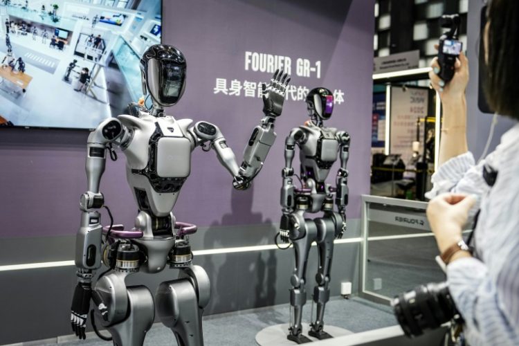 Humanoid robots on  display at the World Artificial Intelligence Conference in Shanghai. ©AFP