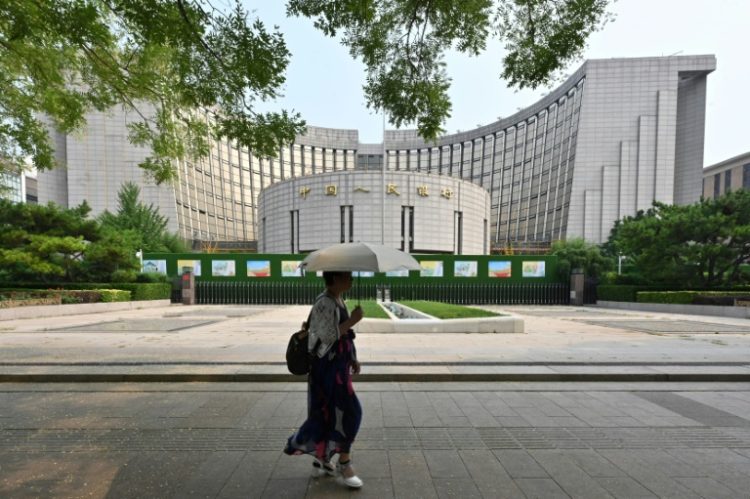 The People's Bank of China has cut two benchmark interest rates in a bid to boost sluggish growth after the post-Covid recovery was brief and less robust than expected. ©AFP