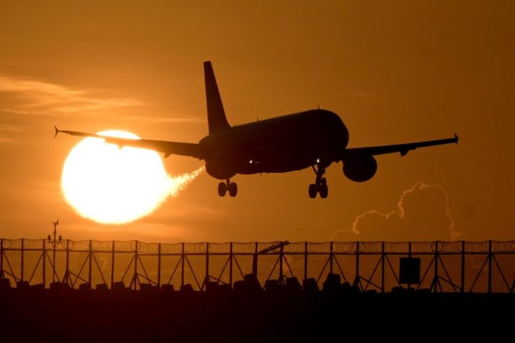 A commercial plane prepares to land at Ngurah Rai international airport in Denpasar, on Indonesia's Bali island . ©AFP