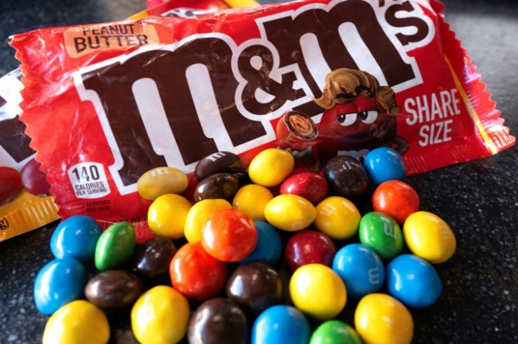 Mars, the business behind M&M's and Snickers, says it reached a deal to acquire Pringles maker Kellanova. ©AFP