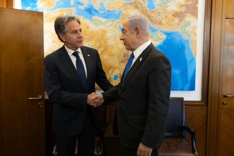 Oil prices have dropped on hopes for a Gaza ceasefire after US Secretary of State Antony Blinken (L) said Israeli Prime Minister Benjamin Netanyahu had accepted a 'bridging proposal' and urged Hamas to do the same. ©AFP