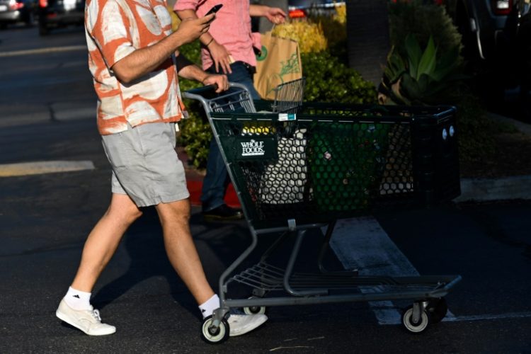 The US personal consumption expenditures price index held firm at 2.5 percent from a year ago in July. ©AFP