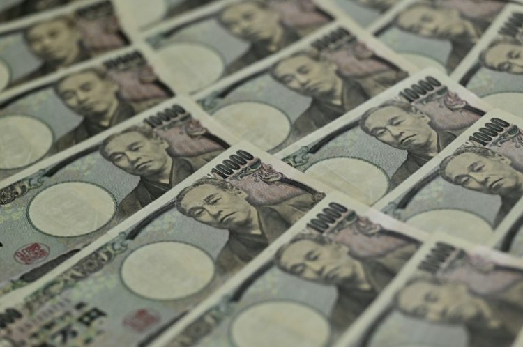 The yen has surged against the dollar to hit its strongest level since January. ©AFP