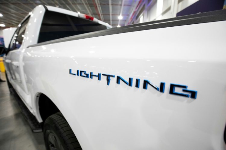 Ford pushed back the timeframe on a 'next generation' electric pickup truck to follow its F-150 Lightning . ©AFP