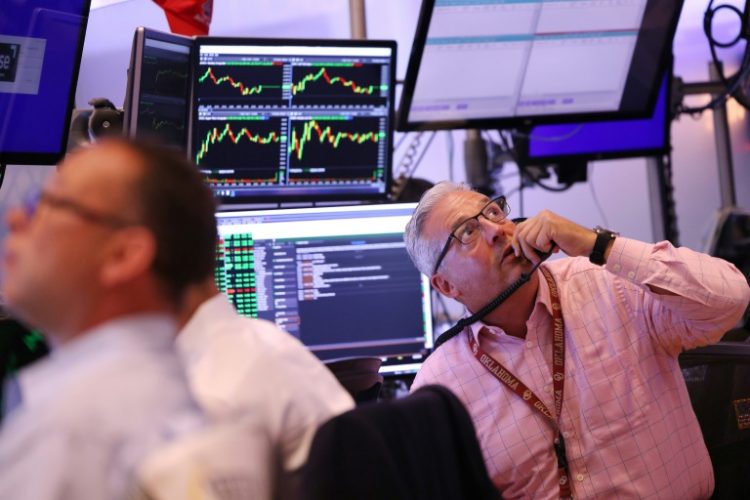 Things were looking up on many trading floors a day after a global rout hit markets over concerns about a US recession. ©AFP