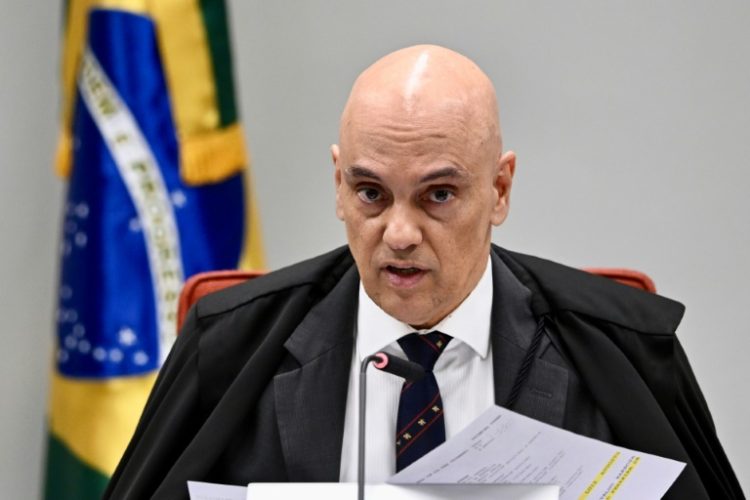 Brazil Supreme Court judge Alexandre de Moraes ordered Elon Musk to name a new legal representative in the country or face X being shut down there. ©AFP